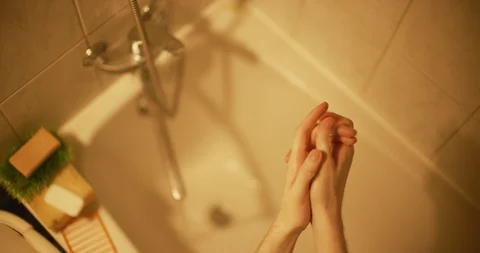 Washing hands with a view from the top Stock Footage 129529356