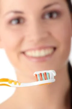 Washing her teeth Stock Photos