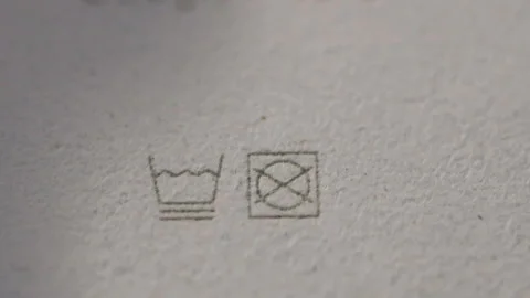 Washing instructions on phone case Stock Footage 228691194