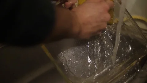 Washing up kitchen pyrex Stock Footage 90361231