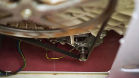 Washing laundry machine drum rust bearing malfunction repair internals view Video stock 130473925