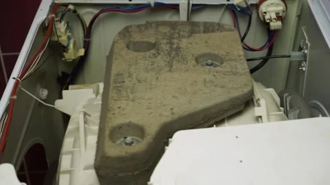 Washing laundry machine drum vibration malfunction repair internals service Stock Footage 153932087