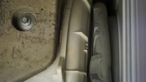 Washing laundry machine excessive drum vibration stone counterweight rubber seal Video stock 130473967