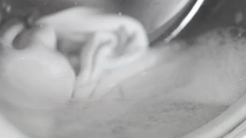 Washing Machine Close-up of Soapy Drum &amp; Clothing Dynamics Stock Footage 301560763