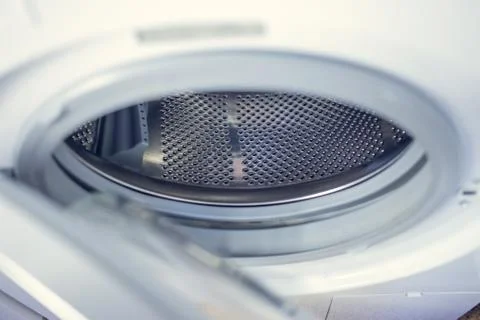 Washing machine - close-up. The texture of the drum. Door Foto stock