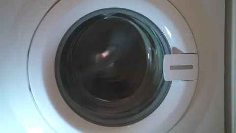 Washing machine close-up washes clothes Stock Footage 261278103