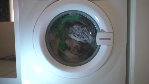 Washing machine close-up washes clothes Stock Footage 261278726
