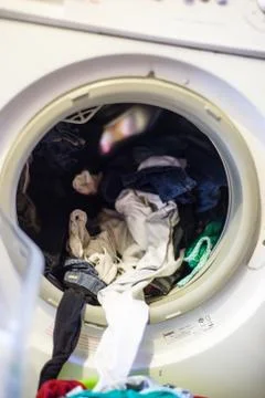 Washing machine with clothes Stock Photos