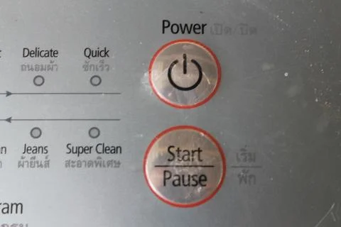 Washing machine control button Stock Photos
