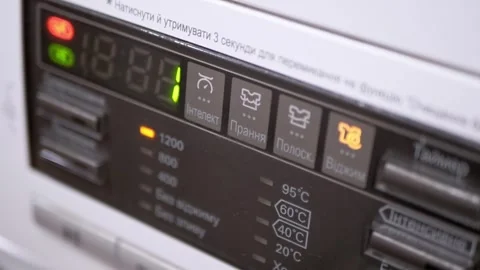 Washing Machine Control Panel with Blinking Indicator Lights Stock Footage 338998219