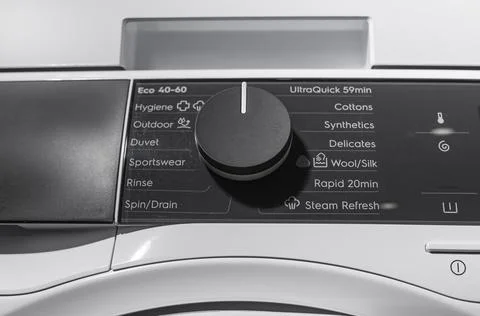 Washing machine control panel with program selector dial. Front loading Foto stock