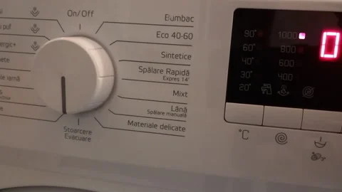 Washing Machine Cycle Start- Selector Clicks, Door Lock, Wash Hum -- Close-up on 스톡 동영상 338170421