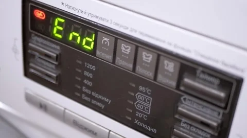 Washing Machine Digital Panel Displaying End Message After Laundry Cycle Stock Footage 338998156