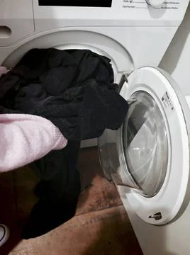  washing machine for doing the laundry, washing textiles and clothes washi... Stock Photos