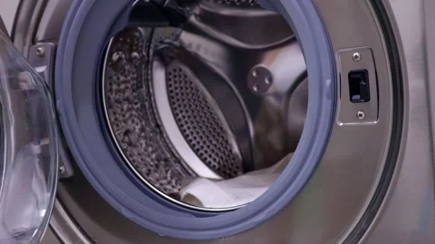 Washing machine door closing close up Stock Footage 278117706
