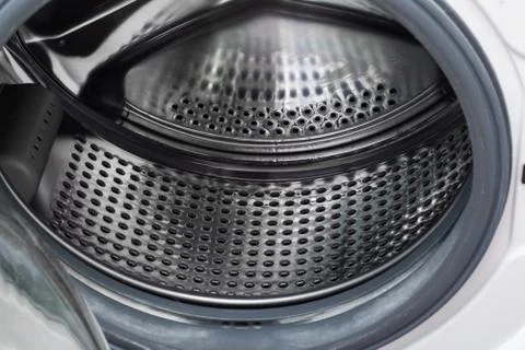 The washing machine drum inside close up Stock Photos