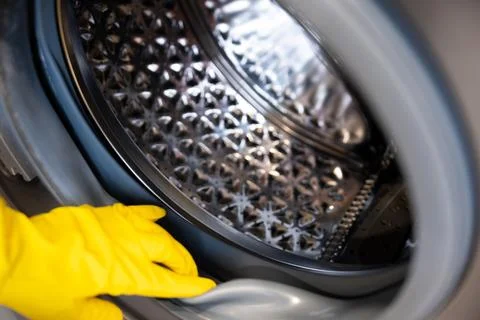 Washing machine drum maintenance Stock Photos