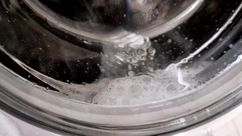Washing Machine Drum Spinning Clothes Water Suds Stock Footage 319013543