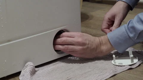 Washing machine filter cleaning Stock Footage 270152871