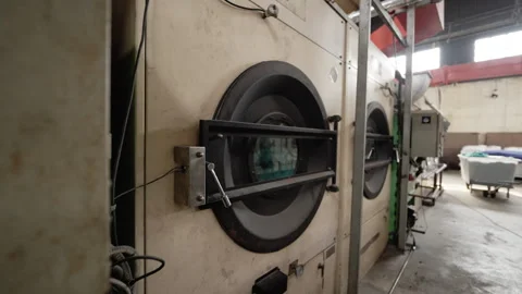 Washing machine-integrated fabric dyeing assembly line Video stock 247411433