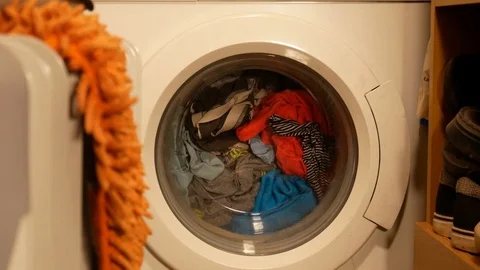 Washing machine with laundry at home Stock Footage 119338597