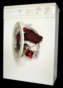 The washing machine with the open hatch inside color linen Stock-Fotos