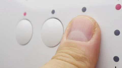 Washing machine. Pressing the panel buttons. Stock Footage