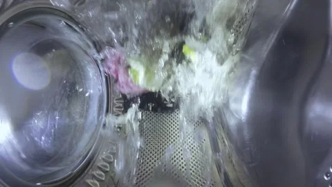 Washing Machine Process with Water Splashing, View from Inside Drum Video stock 332909060