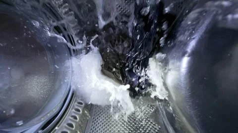 Washing Machine Process with Water Splashing, View from Inside Drum Stock Footage 332909145