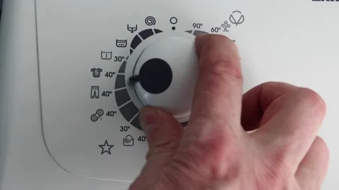 Washing machine program selector switched to hand wash mode. Stock Footage 236123246