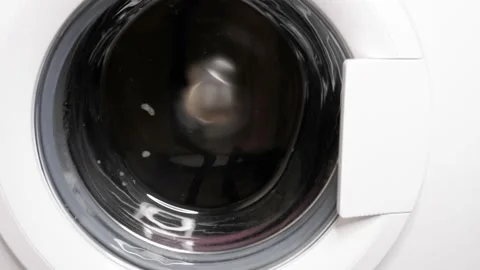 The washing machine is running. White stylish home appliances. Stock Footage 155227060