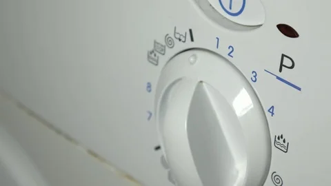 Washing machine. Setting Program On A Washing Machine Close Up, broken. Video stock 84930306