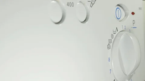 Washing machine. Setting Program On A Washing Machine Close Up Video stock 84930420