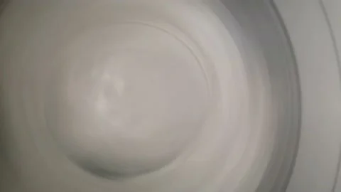 The washing machine is in spin mode. (Selective focus) Stock Footage 130296203