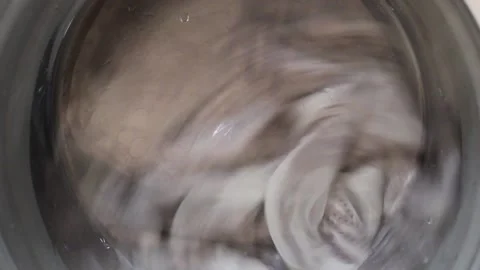 Washing Machine spinning clothes around Stock Footage 234780150