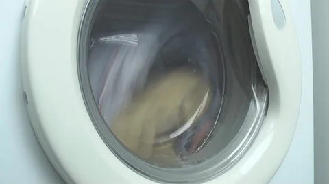 Washing machine spinning washes clothes Video stock 46397327