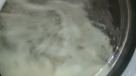 Washing machine starts to work Stock Footage 61750874