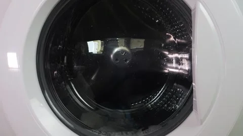 In a washing machine, things are washed, the drum with water and detergent .. Stock Footage 340349894
