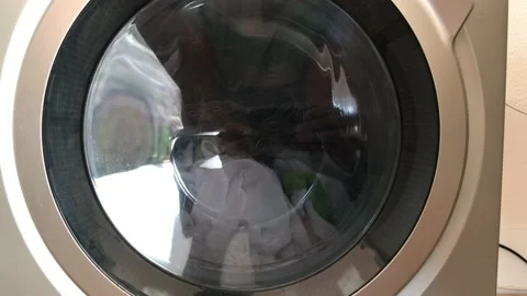 Washing machine turning - close up Stock Footage 132572330