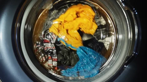 Washing machine washes clothes Stock Footage 88547413