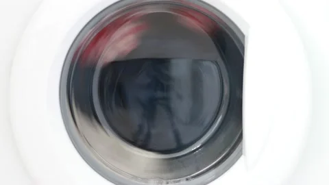 The washing machine washes clothes. Video stock 148073471