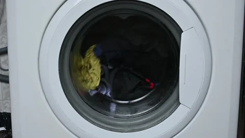 Washing machine washes clothes Stock Footage 185939271