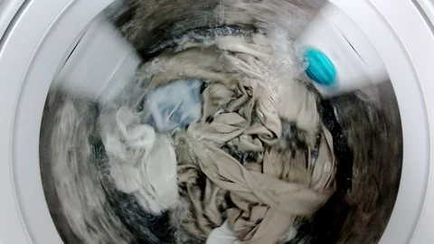 Washing machine washes clothes laundry such as colored. Stock Footage 97519968