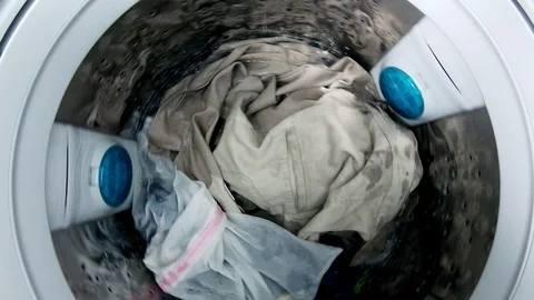 Washing machine washes clothes laundry such as colored. Stock Footage 97521539