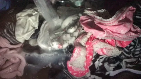 The washing machine washes colored laundry and fills the drum with water Video stock 132637490