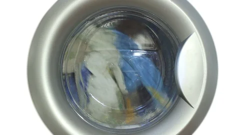 Washing machine washes towels on white background Stock Footage 103220481