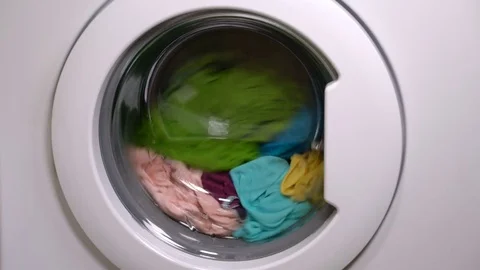 Washing machine is washing clothes 스톡 동영상 77559946
