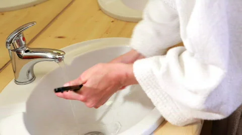 Washing a mirror Stock Footage 726970