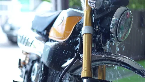 Washing Motorcycle at home while Covid-19 spread Stock Footage 157587149