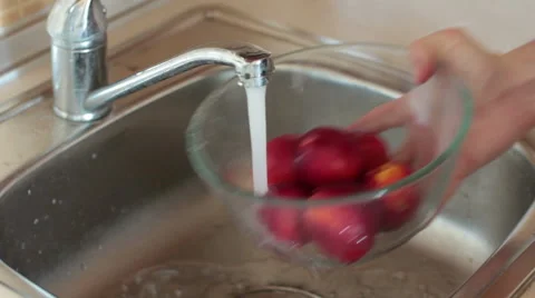 Washing nectarine. Stock Footage 55713871